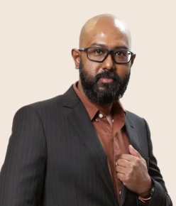 Dr Arnil George Sirimanne